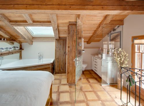 Chalet Zermatt - Chalet Schatzchischta Schlafzimmer mit Eckbadewanne